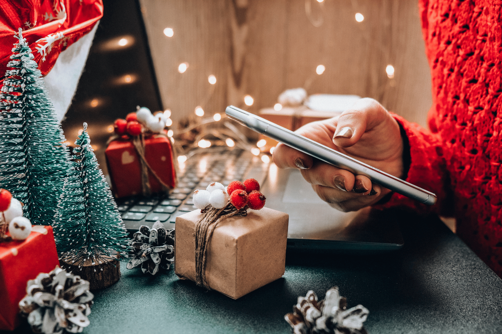 Image of a person finding the best Christmas deals online, comparing prices and saving time shopping from the comfort of their home