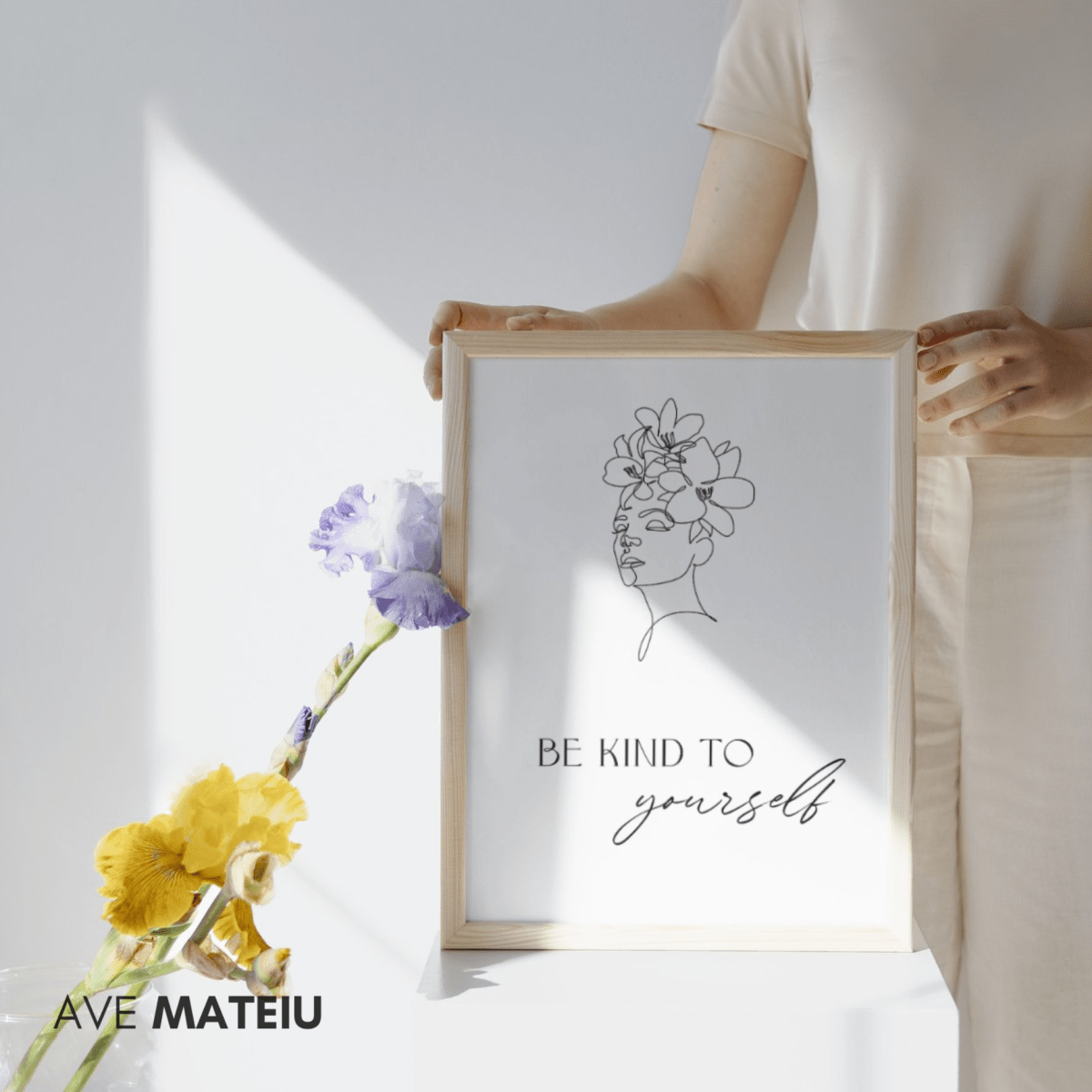 Image featuring a framed wood canva with flowers and the text: Be Kind to Yourself Wall Art Printable Quote