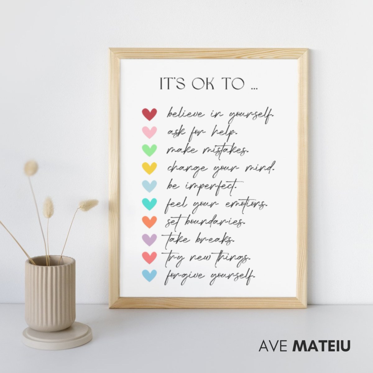 Image featuring a framed wood canva and the text: It’s Ok to Believe in Yourself Boho Wall Art Printable Sayings: it’s ok to believe in yourself, ask for help, make mistakes, change your mind, be imperfect, feel your emotions, set boundaries, take breaks, try new things, forgive yourself.