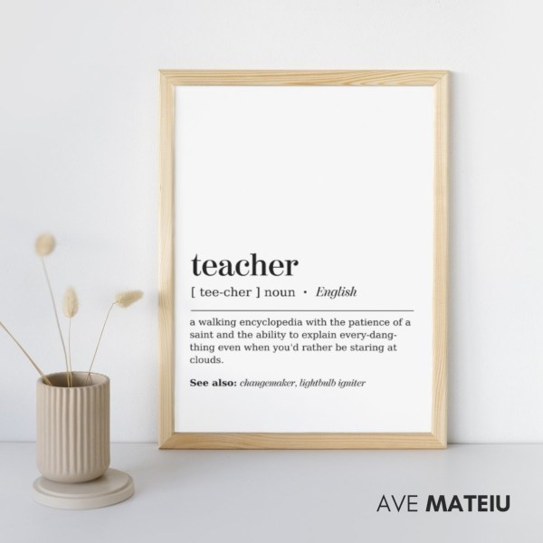 Image featuring the wooden canva frame with the text: Teacher Definition Printable Minimalist Wall Art + the definition of the noun word 'teacher': a walking encyclopedia with the patience of a saint and the ability to explain every-dang-thing even when you'd rather be staring at clouds.