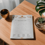 Thanksgiving Word Search Game Printed Printed Thanksgiving Word Search game sheet displayed on a festive table — printable Thanksgiving activity for parties.