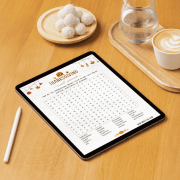 Tablet iPad showing Thanksgiving Word Search printable game – ready-to-play digital holiday activity for family fun or classroom use.