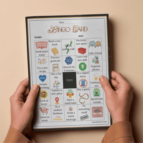 A person holds a bingo card featuring self-care activities like reading, exercising, and decluttering. The tone is encouraging and playful.