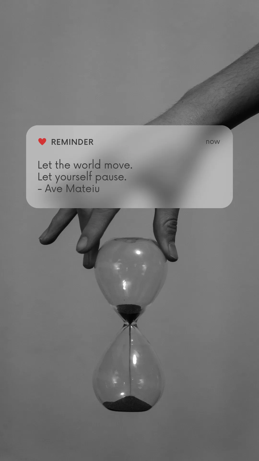 Simple motivation phone wallpaper featuring Let the world move. Let yourself pause by Ave Mateiu with grunge black and white hourglass background